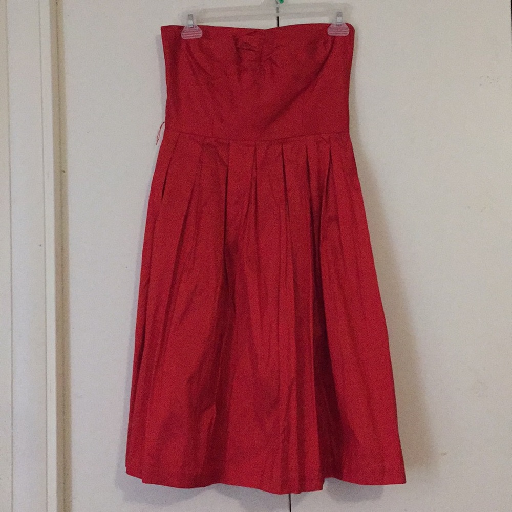 Red strapless dress.